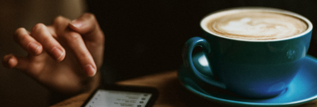 Coffee and Cell by Daiga Ellaby on Unsplash A close-up of a phone and a cup of coffee